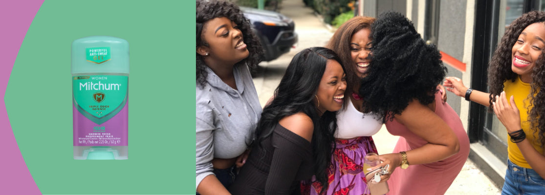 Mitchum deodorant bottle with a group of women laughing together on a street.